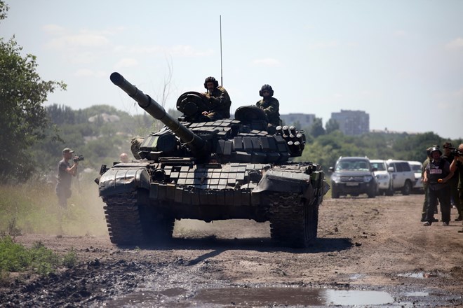 Chính quyền Ukraine-phe ly khai đạt thỏa thuận sơ bộ rút vũ khí